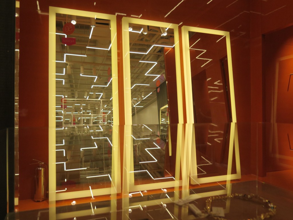 Led mirrors and ceiling lighting reflections in front of the dressing rooms