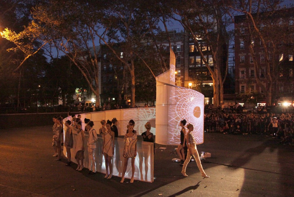 Vortex, performance / show of Spring / Summer 2011 collection at Sara Roosevelt Park, Chinatown (New York, New York; 2010). Two-way spiral screen in collaboration with architect Christian Wassman. Photo: Ross Menuez