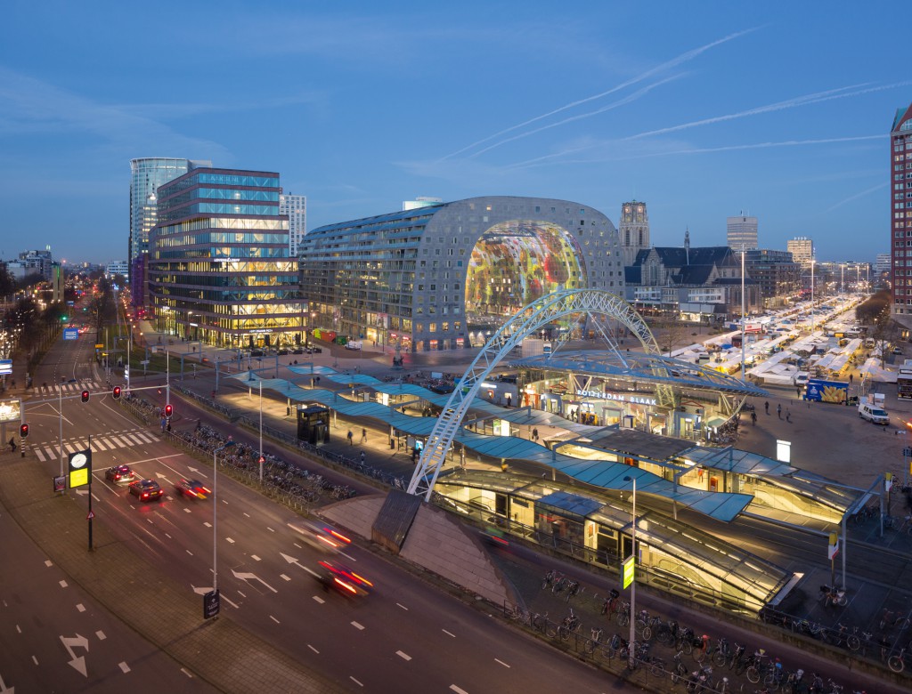 Aerial view of the Markthal at dusk, looking North West over Blaak station. (Photo © Ossip van Duivenbode)