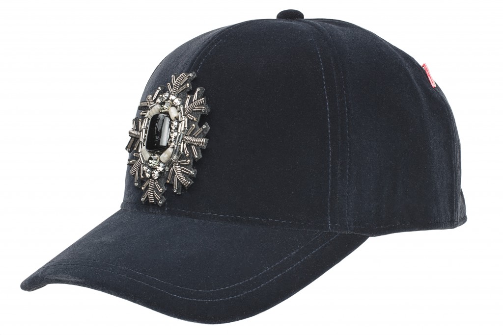 A Made in Italy baseball cap embellished with a gilded brooch 