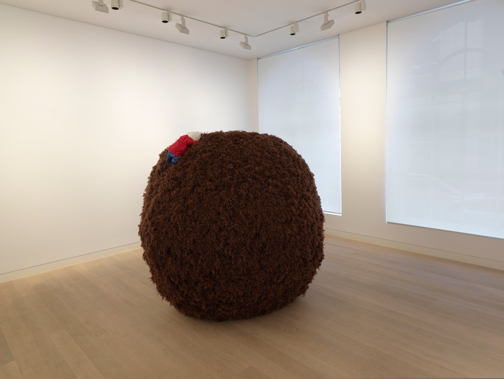 Untitled, 1999 wool and styrofoam in two parts 72 7/8 in. (185 cm.) sphere diameter 21 5/8 x 9 7/8 x 5 7/8 in. (55 x 25 x 15 cm.) doll